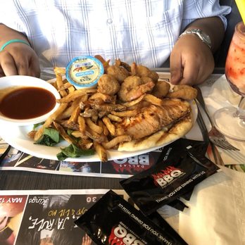 Dallas BBQ - Jamaica - Salmon and crispy shrimp with fries - Barbeque Near Me - Jamaica, New York