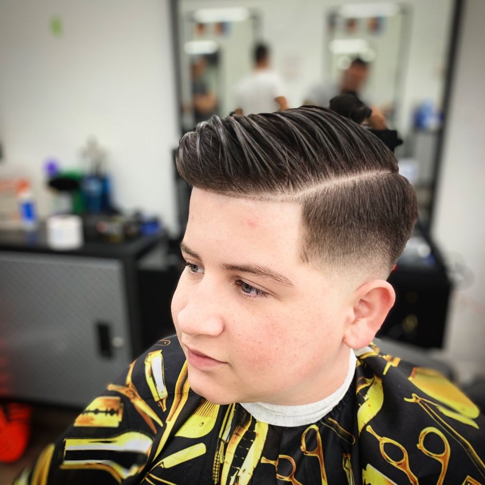 El Nene Barbershop Logo