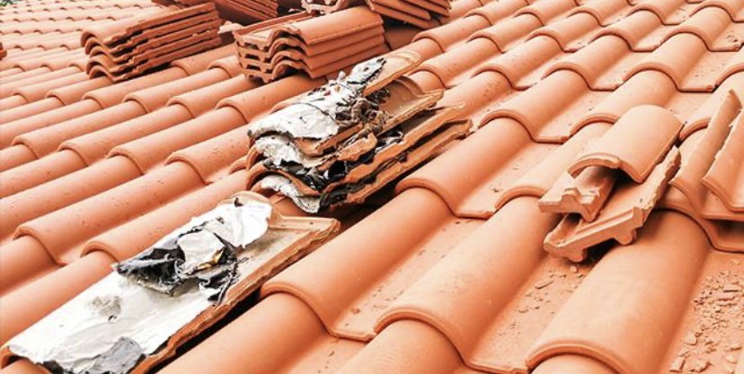 Slide of Leon’s Roofing Repairs