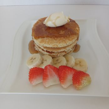 Mennonite Cafe - Pancakes with syrup and fruit. - Coffee & Tea Near Me - Brownfield, Texas Mennonite Cafe - Pancakes with syrup and fruit. - Coffee & Tea Near Me - Brownfield, Texas