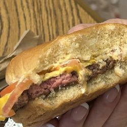 Wendy's - This is a raw junior bacon cheeseburger from the biggie bag