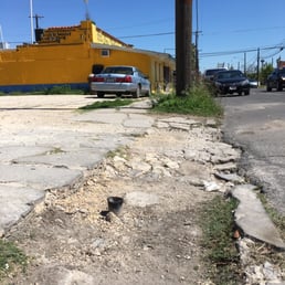 Tire damaging object, left parking lot entrance.