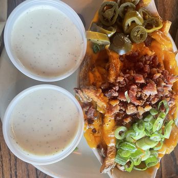 Snuffers - Cheese Cheddar Fries loated - American Near Me - Dallas, Texas