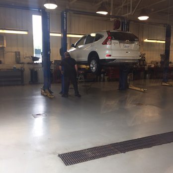 Fox Saab Service - Hard at work the mechanics - Auto Repair Near Me - Grand Rapids, Michigan