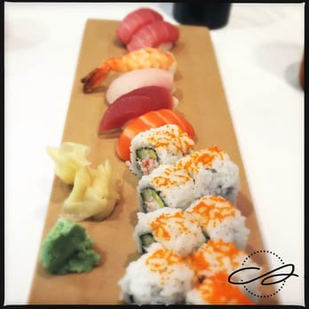Eiko's - Oxbow - combo A (8 pc ca roll, 4pc nigiri) and 2 pcs of chu toro (fatty tuna) - front to back - Sushi Bars Near Me - Napa, California Eiko's - Oxbow - combo A (8 pc ca roll, 4pc nigiri) and 2 pcs of chu toro (fatty tuna) - front to back - Sushi Bars Near Me - Napa, California