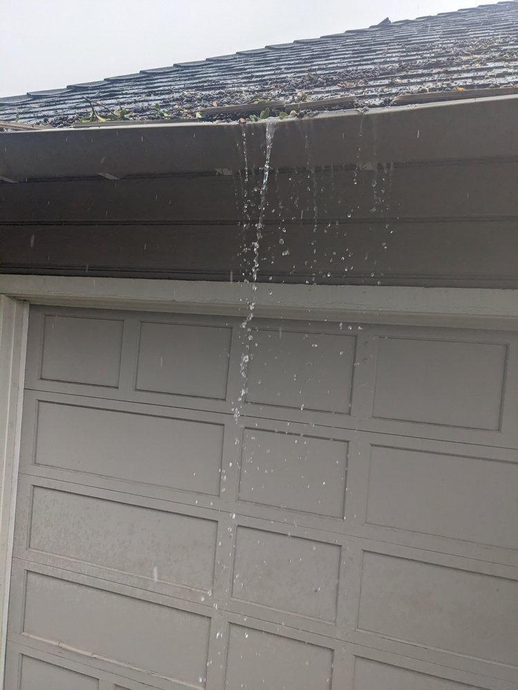 Slide of Alex Gutter & Roof