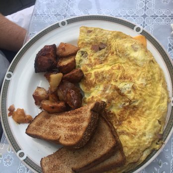 Thornton's Restaurant - Omelette with fried potatoes and toast - Breakfast & Brunch Near Me - Boston, Massachusetts Thornton's Restaurant - Omelette with fried potatoes and toast - Breakfast & Brunch Near Me - Boston, Massachusetts