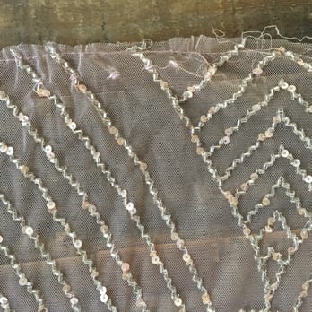 Susan's Alteration - The strands of beading coming off and the sloppy and shoddy hem job at the bottom - Sewing & Alterations Near Me - Torrance, California