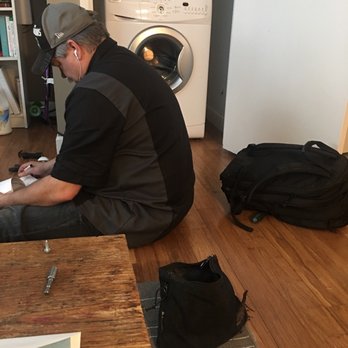 Hamilton's Appliance - Jason hard at work sourcing parts for our broken washer.  He is amazing!  Highly HIGHLY recommend this service tech and this company. - Appliances Near Me - Gladstone, Oregon