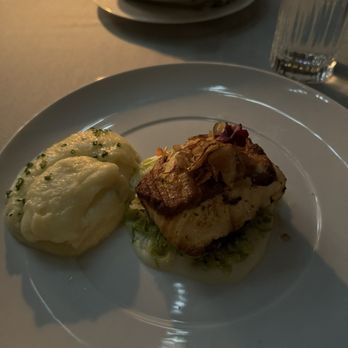 Maple & Ash - Slow-Roasted Sea Bass (w/side of mashed potatoes) - Steakhouses Near Me - Scottsdale, Arizona Maple & Ash - Slow-Roasted Sea Bass (w/side of mashed potatoes) - Steakhouses Near Me - Scottsdale, Arizona