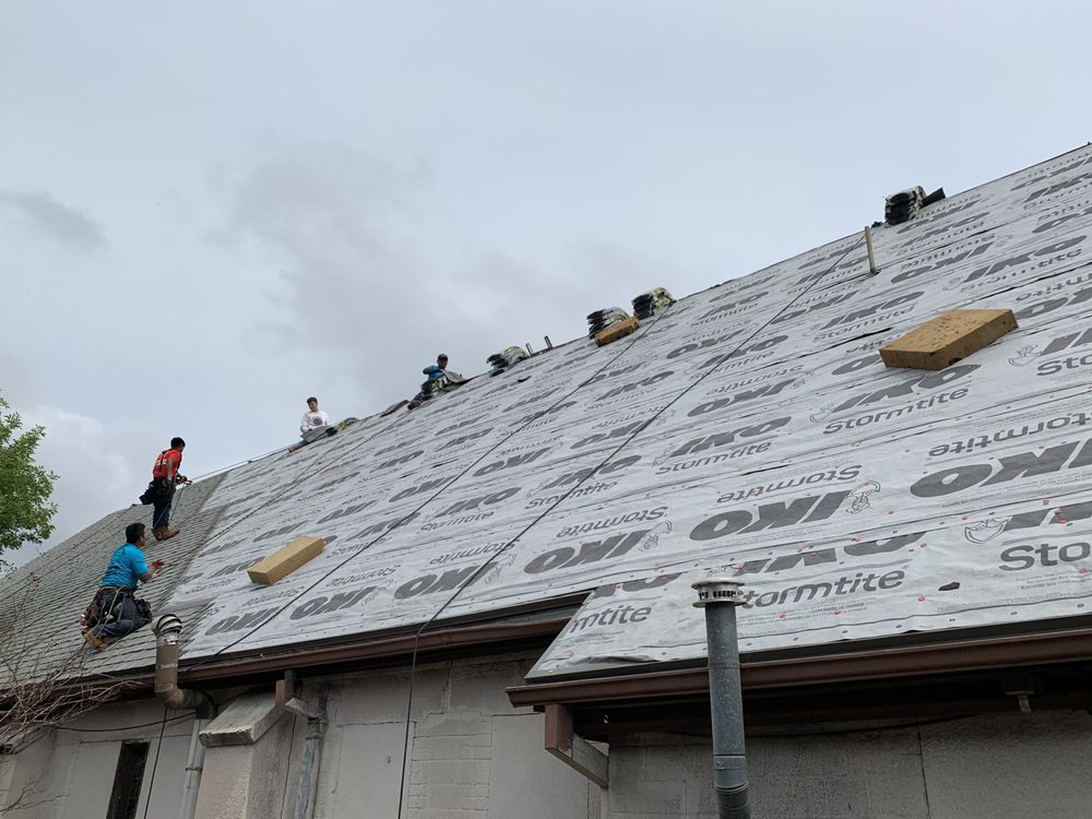 Slide of Trinity Roofing & Restoration