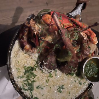 La Piscina - Lobster fajitas with bacon wrapped shrimp and lamb - Mexican Near Me - Austin, Texas La Piscina - Lobster fajitas with bacon wrapped shrimp and lamb - Mexican Near Me - Austin, Texas