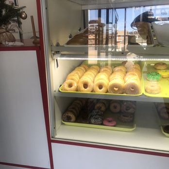 Donut Delight - a display case filled with donuts - Donuts Near Me - Tyler, Texas