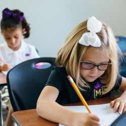 Mercy Preparatory Academy - Our kindergarten students are working on their journals.