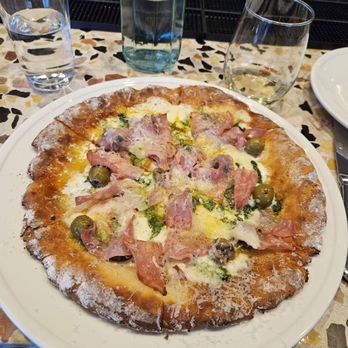 Benzina - Mortadella pizza with gluten free crust - Italian Near Me - Denver, Colorado Benzina - Mortadella pizza with gluten free crust - Italian Near Me - Denver, Colorado
