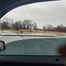 McDonald's - Large parking lot and picnic table area.