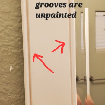 Re-Bath - a bathroom mirror with a red arrow pointing to the mirror - General Contractors Near Me - Tucson, Arizona Re-Bath - a bathroom mirror with a red arrow pointing to the mirror - General Contractors Near Me - Tucson, Arizona