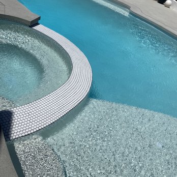 Poolmax - Added a Baja step and increased size of hot tub, love the new tile! - General Contractors Near Me - Fountain Valley, California