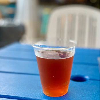 Bummz Beach Cafe - a plastic cup on a blue table - Cafes Near Me - Myrtle Beach, South Carolina Bummz Beach Cafe - a plastic cup on a blue table - Cafes Near Me - Myrtle Beach, South Carolina
