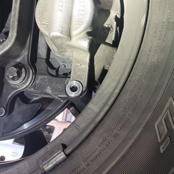 Embassy Tire & Wheel - Brake caliper missing screws and just hanging inside my tire. Idiots sent me home like this. - Tires Near Me - Tucson, Arizona