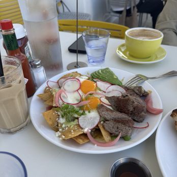 Poached Kitchen - Chilaquiles verdes with the added steak - Breakfast & Brunch Near Me - Whittier, California Poached Kitchen - Chilaquiles verdes with the added steak - Breakfast & Brunch Near Me - Whittier, California