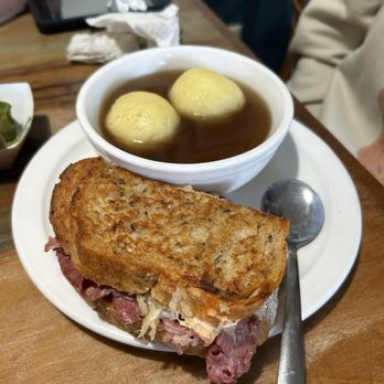 Katzinger's Delicatessen - Ruben, Matzo Ball Soup (1/2 Sandwich and Soup combo) - Delis Near Me - Columbus, Ohio Katzinger's Delicatessen - Ruben, Matzo Ball Soup (1/2 Sandwich and Soup combo) - Delis Near Me - Columbus, Ohio