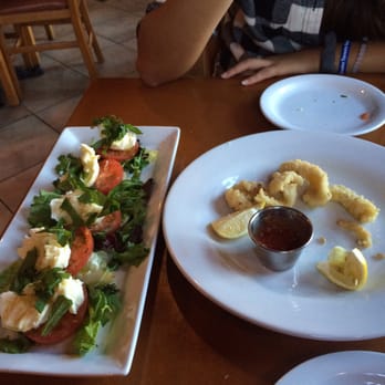 Spago Trattoria E Pizzeria - Fried calamari and bocacinni/tomato basil salad appetizers - Italian Near Me - Windsor, Ontario