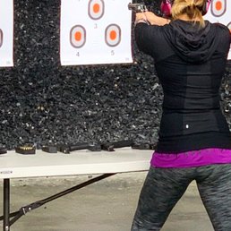 Trying out a variety of handguns Trying out a variety of handguns