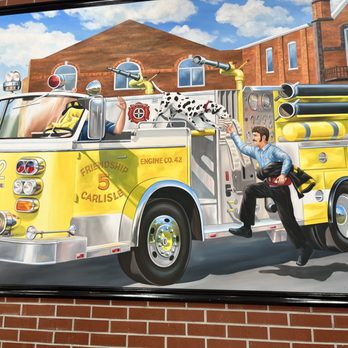 Firehouse Subs - a fire truck painted on the side of a building - Fast Food Near Me - Carlisle, Pennsylvania