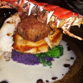 Tidepools - lobster, swordfish, crabcake on purple sweet potatoe with sauce served with brocolli - Hawaiian Near Me - Poipu, Hawaii