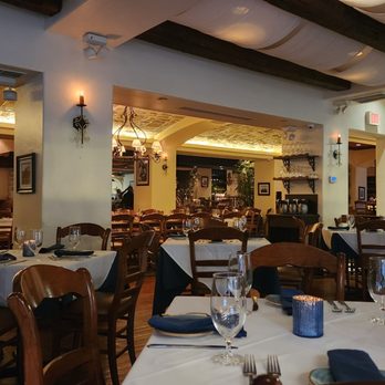 Estia - a dining room with tables and chairs - Greek Near Me - Philadelphia, Pennsylvania