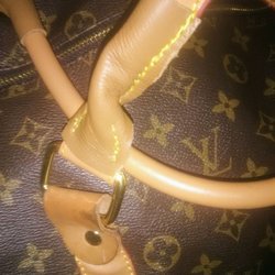 Southwest Shoe & Luggage Repair - Handle to my Louis Vuitton duffle bag that he repaired.