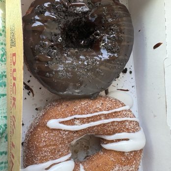 Duck Donuts - Chocolate glaze with cookie crumble (I think), cinnamon sugar with vanilla drizzle - Donuts Near Me - Corolla, North Carolina Duck Donuts - Chocolate glaze with cookie crumble (I think), cinnamon sugar with vanilla drizzle - Donuts Near Me - Corolla, North Carolina