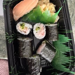 Yellowtail with scallion roll and white tuna Yellowtail with scallion roll and white tuna