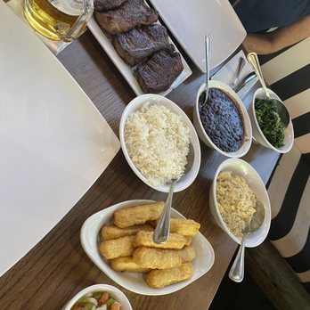 Boteco Do Manolo & Marcelo - Picanha Orlando and side dishes: rice, black beans, egg farofa, and steamed greens - Brazilian Near Me - Deerfield Beach, Florida Boteco Do Manolo & Marcelo - Picanha Orlando and side dishes: rice, black beans, egg farofa, and steamed greens - Brazilian Near Me - Deerfield Beach, Florida