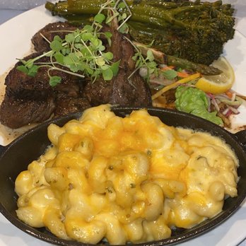 Papi Cuisine - Honey Jerk Lamb Chops, Baked 4 Cheese, Broccolini - Cocktail Bars Near Me - Baltimore, Maryland Papi Cuisine - Honey Jerk Lamb Chops, Baked 4 Cheese, Broccolini - Cocktail Bars Near Me - Baltimore, Maryland
