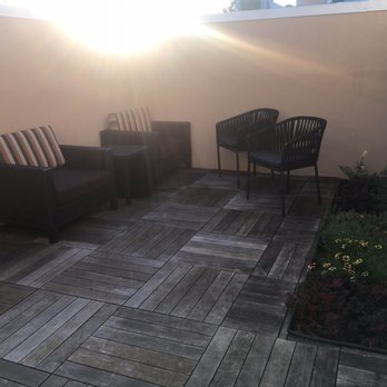 Courtyard by Marriott Oxford - Outdoor seating off the upstairs door of hotel room - Hotels Near Me - Oxford, Mississippi