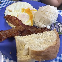 Over easy, white rice, bacon and the amazing fresh baked bread! Over easy, white rice, bacon and the amazing fresh baked bread!