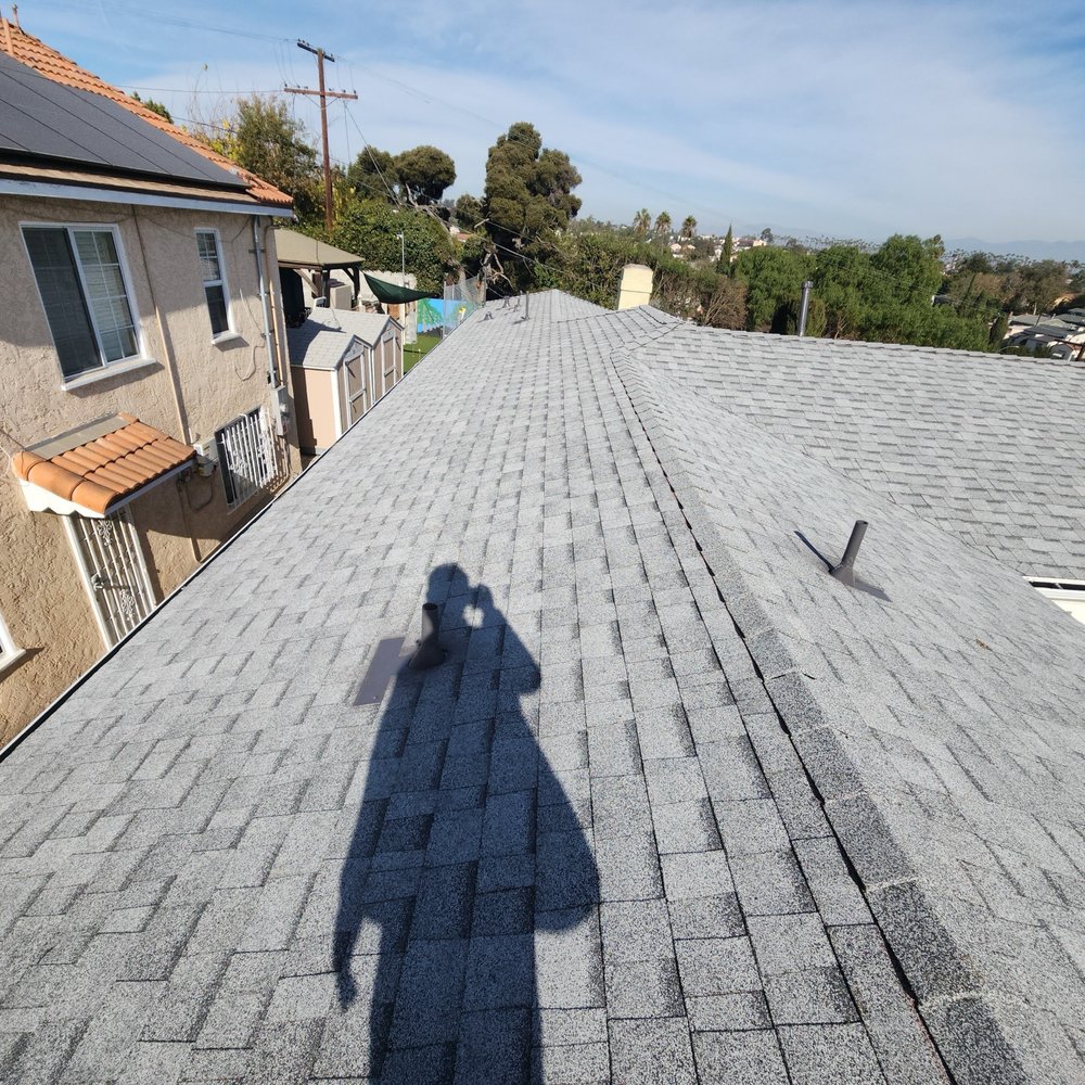 Slide of Pro Roofing Experts