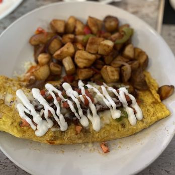 Toast Kitchen & Bar - Chorizo Omelette - Breakfast & Brunch Near Me - Brea, California Toast Kitchen & Bar - Chorizo Omelette - Breakfast & Brunch Near Me - Brea, California