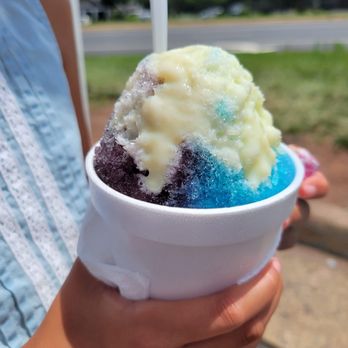 Mama Rosa’s Ice - a person holding a cup of ice cream - Shaved Ice Near Me - Manassas, Virginia Mama Rosa’s Ice - a person holding a cup of ice cream - Shaved Ice Near Me - Manassas, Virginia