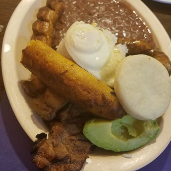 Brasa Roja - Bandeja Paisa (Pork, steak, avocado, arepa, egg, rice, beans, chorizo) - Latin American Near Me - Chicago, Illinois Brasa Roja - Bandeja Paisa (Pork, steak, avocado, arepa, egg, rice, beans, chorizo) - Latin American Near Me - Chicago, Illinois