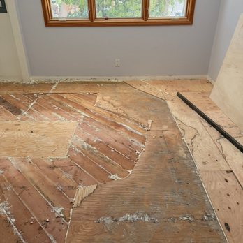 Hardwood Floor Specialist - They added plywood before the leveling concrete to help level the floor. A skilled craft that many folks didn't know how to do properly. - Flooring Near Me - Rosemead, California
