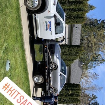 Kitsap Towing - Vehicle on flatbed tow truck. - Towing Near Me - Silverdale, Washington