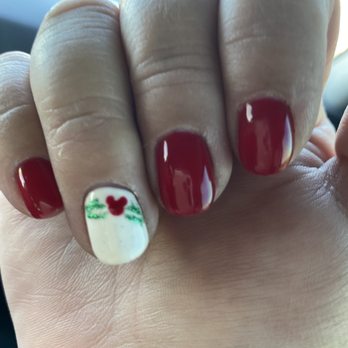 Blooming Nails and Spa - What I got, a thick white nail and just one design because they couldn't get the wreathe right. - Waxing Near Me - Glendale, Arizona Blooming Nails and Spa - What I got, a thick white nail and just one design because they couldn't get the wreathe right. - Waxing Near Me - Glendale, Arizona