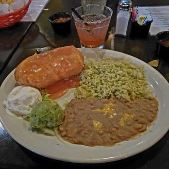 Urbano Enchilada Taco Bar - Shredded chicken chimichanga w/ ranchero sauce and poblano rice & refried beans - Mexican Near Me - Flower Mound, Texas Urbano Enchilada Taco Bar - Shredded chicken chimichanga w/ ranchero sauce and poblano rice & refried beans - Mexican Near Me - Flower Mound, Texas