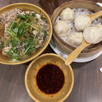 Julie's Noodles - Spicy Beef Suan Tsai Noodles and 2. Pork Soup Dumplings - Noodles Near Me - Austin, Texas Julie's Noodles - Spicy Beef Suan Tsai Noodles and 2. Pork Soup Dumplings - Noodles Near Me - Austin, Texas