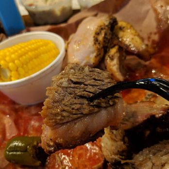 Cooper's Old Time Pit Bar-B-Que - Brisket bite - Barbeque Near Me - Austin, Texas Cooper's Old Time Pit Bar-B-Que - Brisket bite - Barbeque Near Me - Austin, Texas