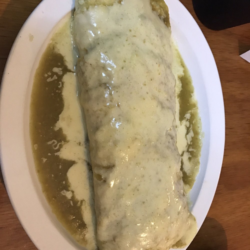 El Agave Bar And Grill - Beef Burrito Verde. Beef burrito covered with cheese dip and green salsa. A worthy opponent - Mexican Near Me - Montevallo, Alabama