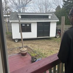 Barnco Woodworks - One guy used a remote control to place our shed on the pad! Amazing